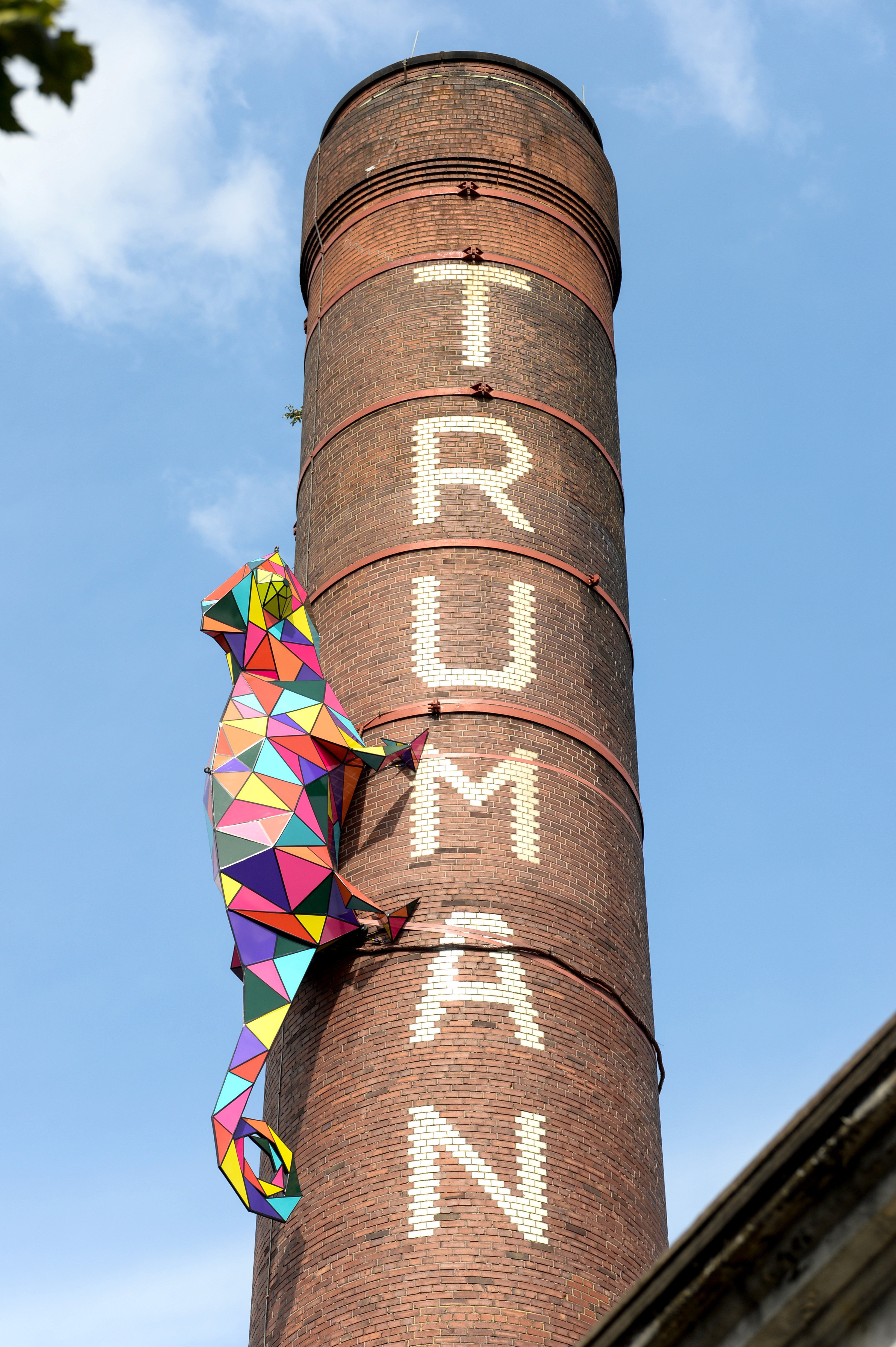EDITORIAL USE ONLY An 8 metre sculpture of a Chameleon is installed on the chimney of the Old Truman Brewery in East London where it will be on display until September 1st to launch the new nhow Hotel in Shoreditch. PRESS ASSOCIATION Photo. Picture date: Thursday August 29, 2019. Photo credit should read: Doug Peters/PA Wire