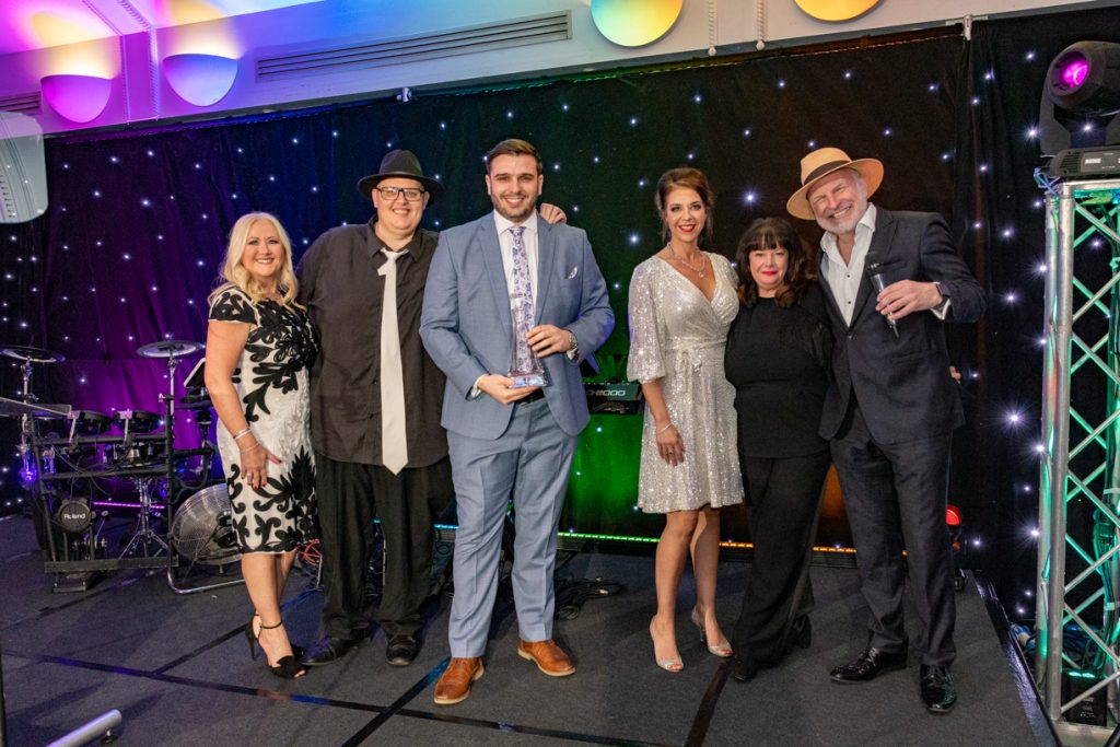 Louise Araguez (second right), Blooming Fabulous Flowers presented the award to Logobrand